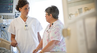 Two nurses at bedside