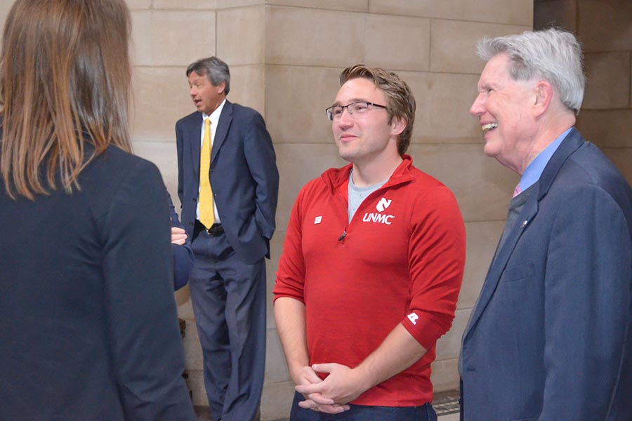 UNMC Delegates members talk with a state senator.