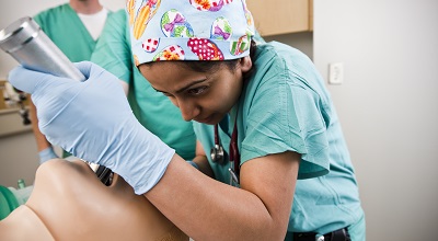 Student in the Clinical Skills Center sim lab