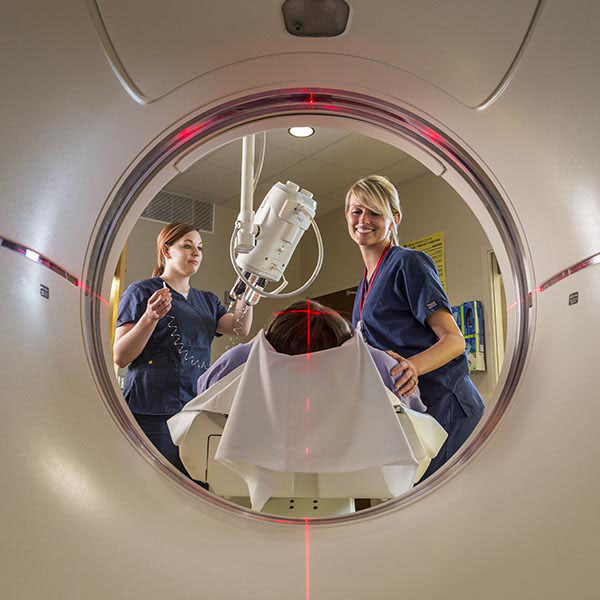Students using MRI scanner