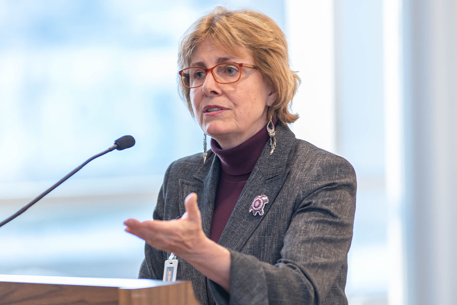 Dr. Larsen talking to a crowd