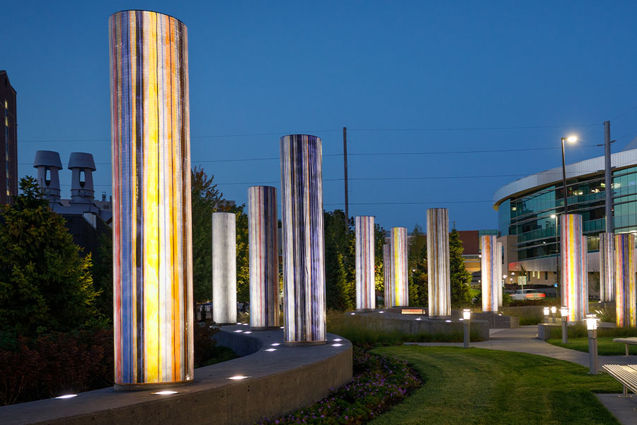 Medical plaza at night with pillars lighted