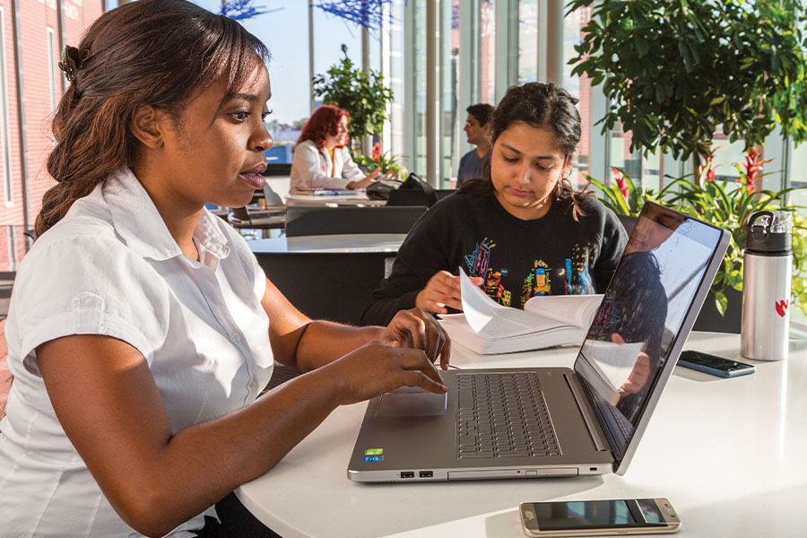 Students at table studying