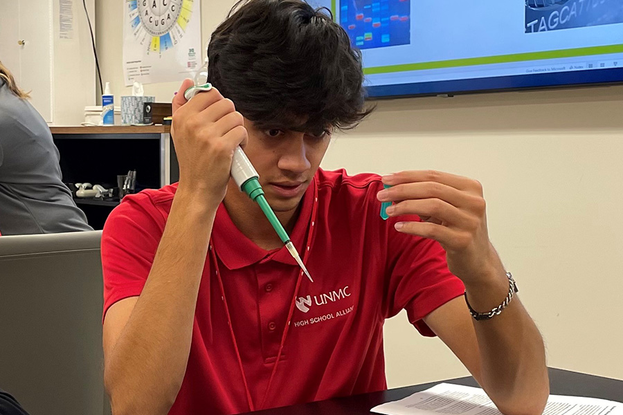 Student practicing how to pipette