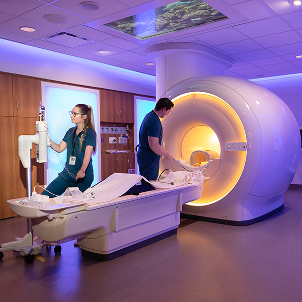 Magnetic Resonance Imaging students with the MRI machine