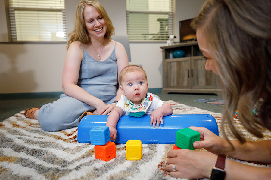 Parent and infant with an occupational therapist