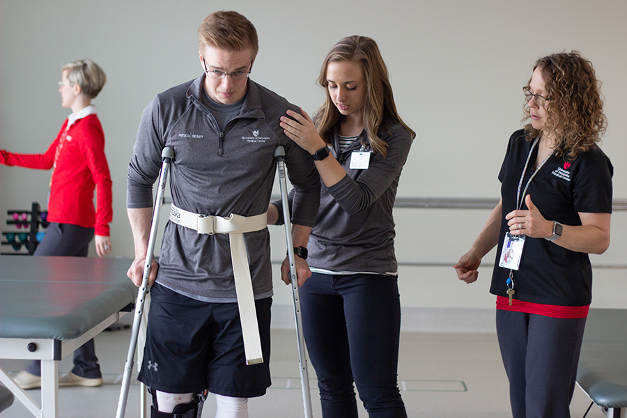 physical therapy students practice in lab