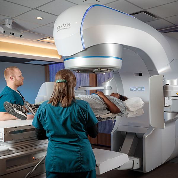 Radiation therapy students with a standardized patient