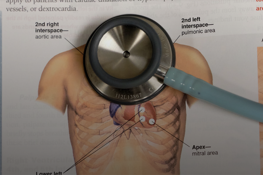 textbook with stethoscope