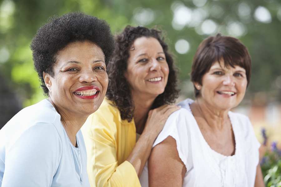 Three older women outdoors