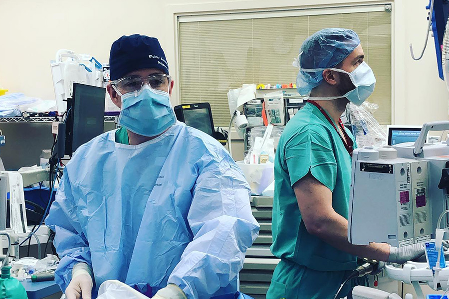 Anesthesiologists in an operating room.