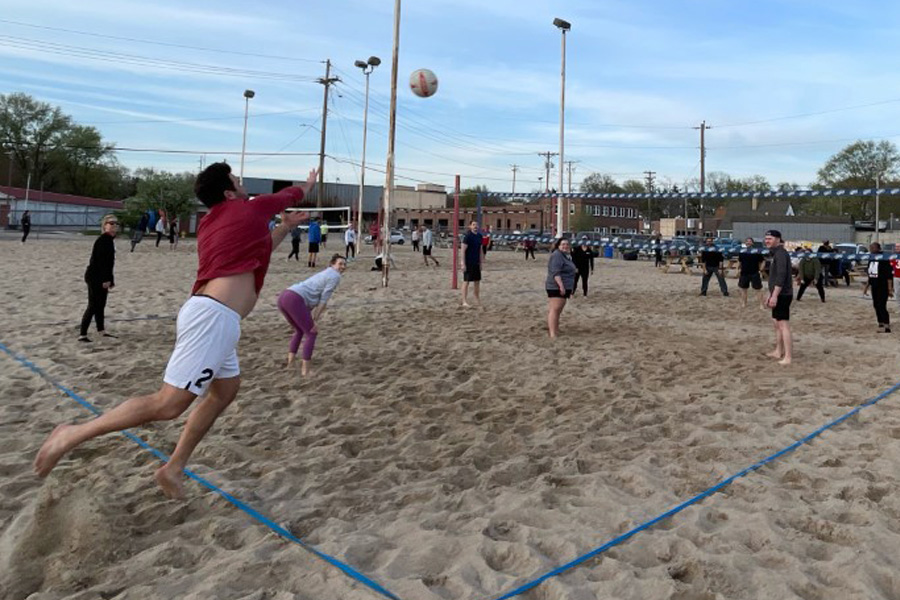 group of residents playing volleyball