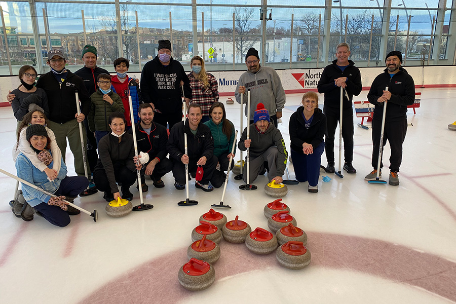 Residents and faculty learning to curl