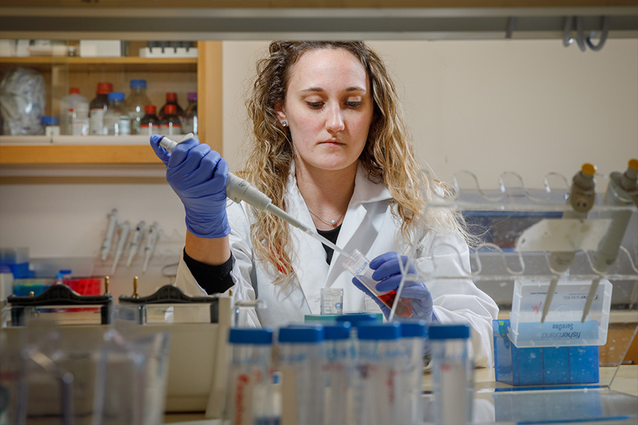 Research team member working in lab