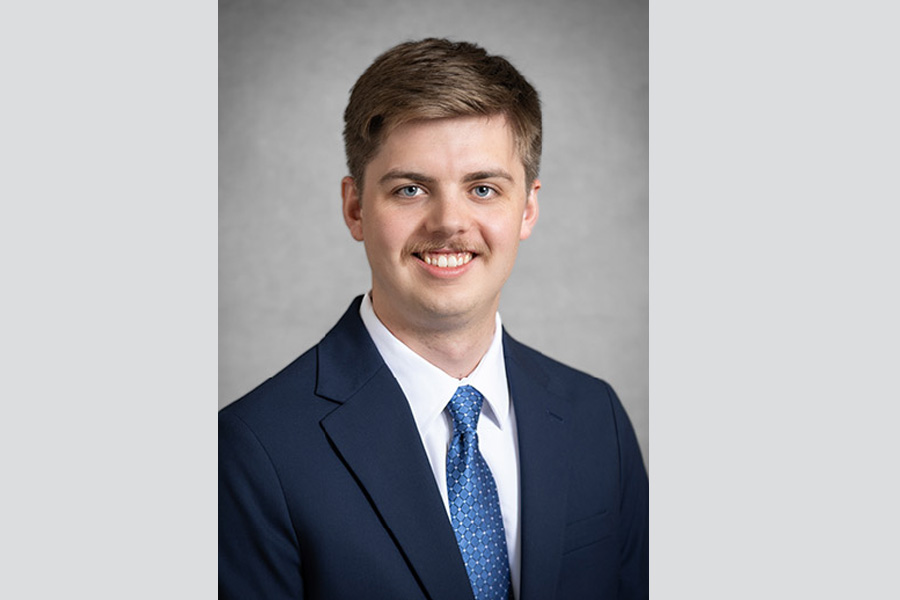 Garret Williams, MD, headshot in professional business attire
