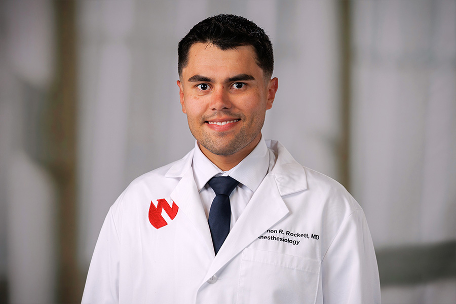 Vernon Rockett, MD, headshot in white lab coat