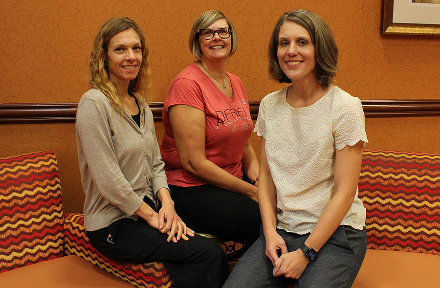 A photo of Sara Hunt, PhD, (center) Assistant Dean of Behavioral Health Sciences at the Kerkorian School of Medicine at the University of Nevada-Las Vegas, BHECN’s Erin Schneider, EdD, (Right) and Marley Doyle, MD, (left). 
