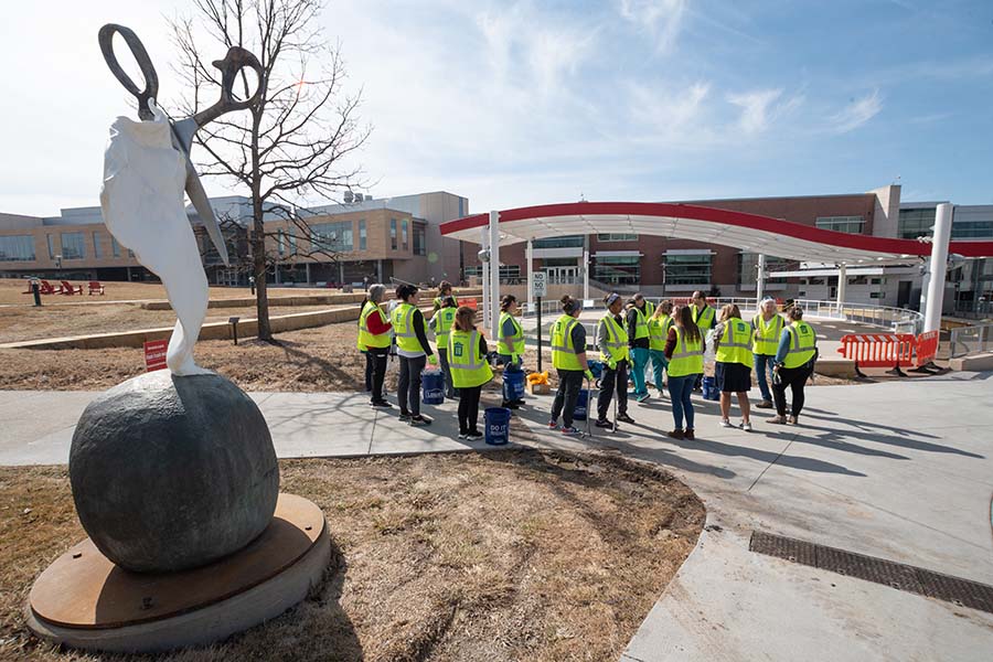 Members of the UNMC/Nebraska Medicine LiveGreen Ambassdors gather for a spring campus cleanup.