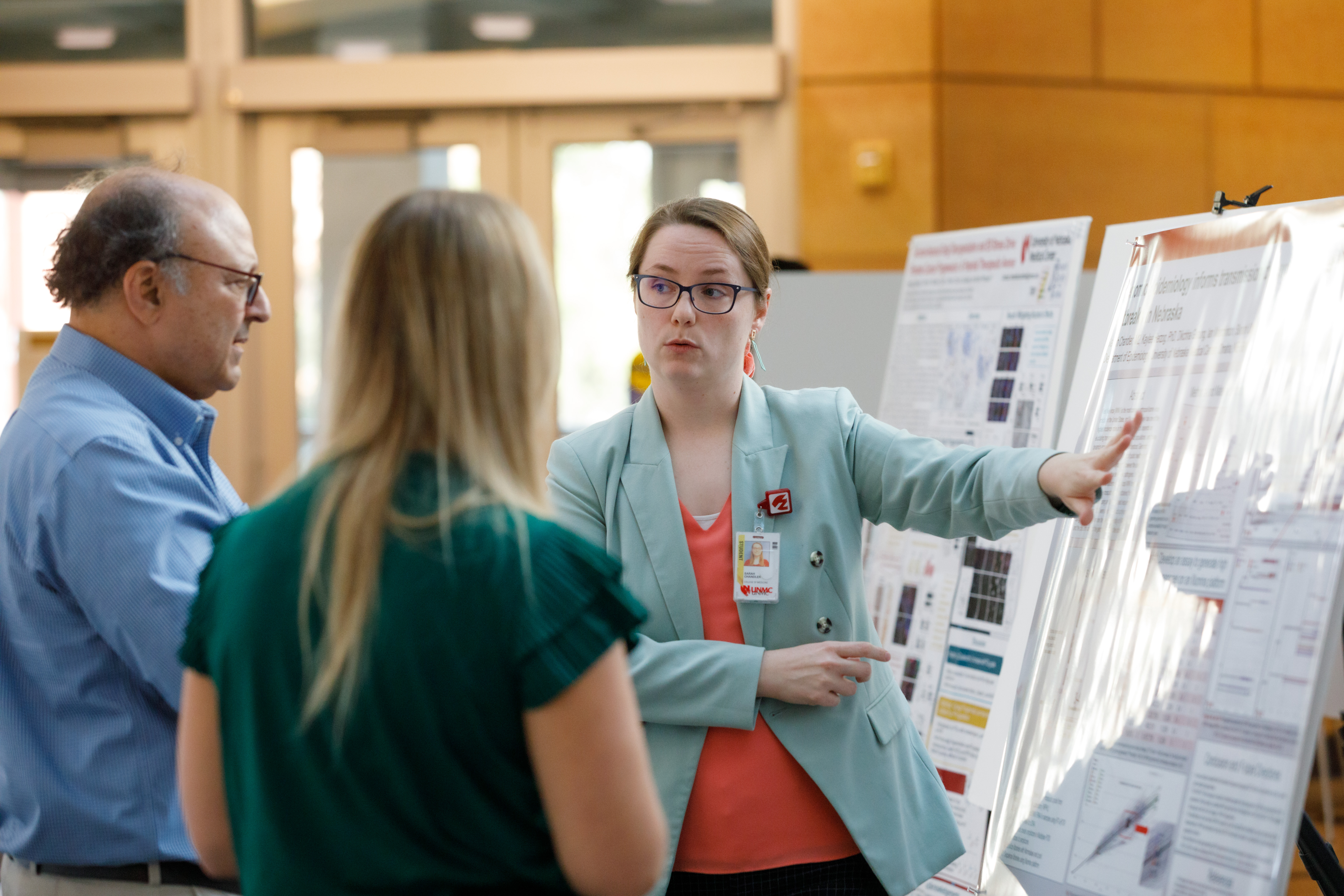 Student presenting a poster