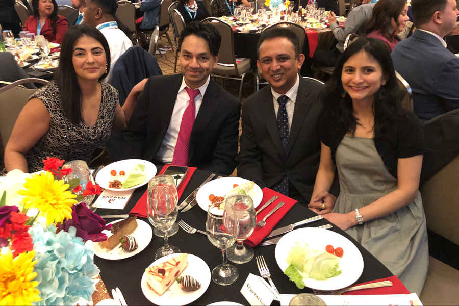 four people sitting at a table at the Team Jack fundraiser