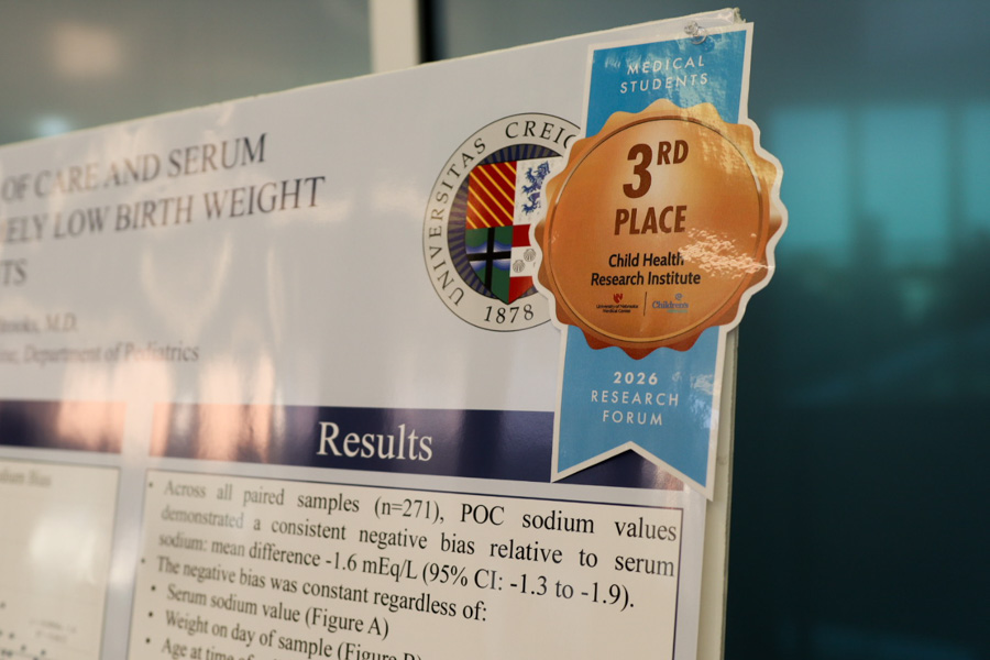close up of research poster and third place ribbon.