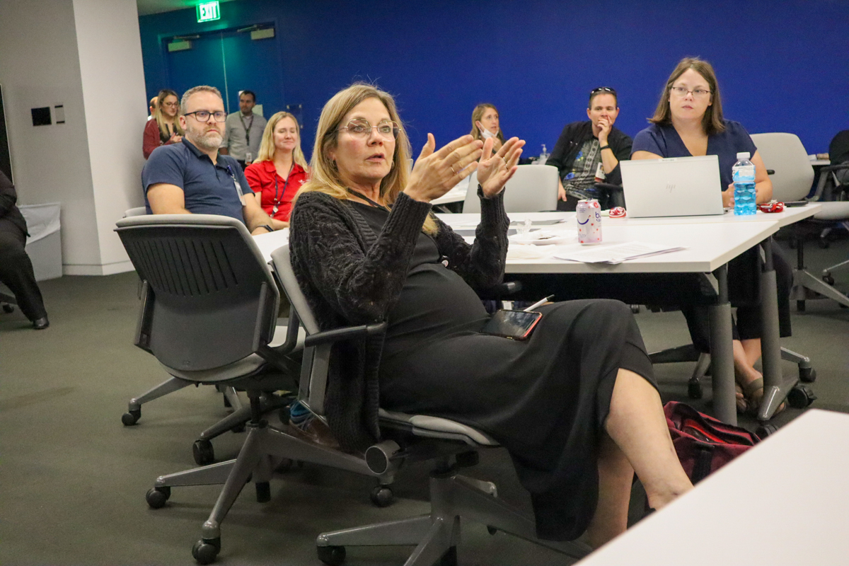 people sitting at a table at Pediatric Academic Workshop