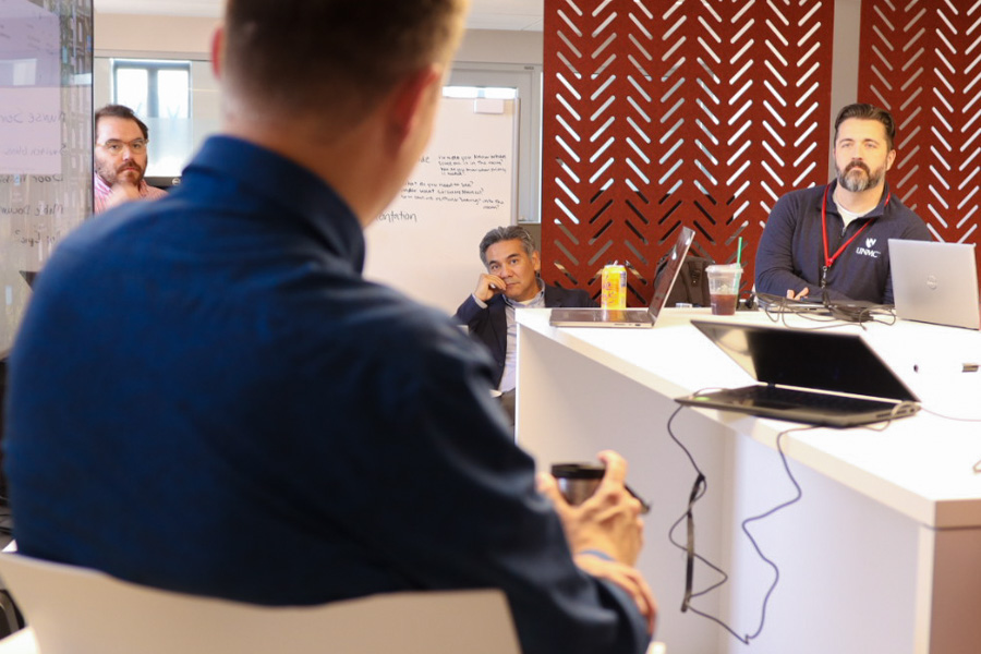 people listen to speaker at CHRI event