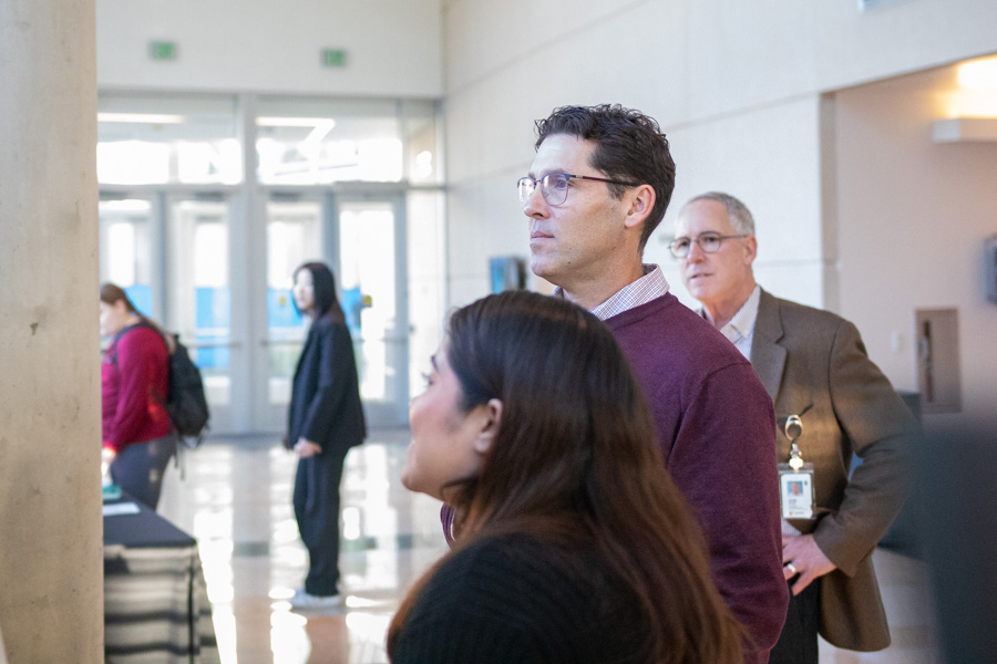 people look at scientific posters