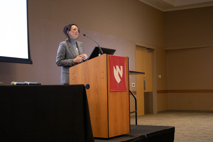 Woman speaks at podium