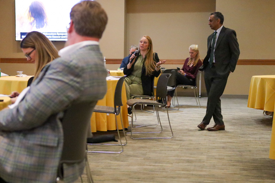 a man and woman at conference
