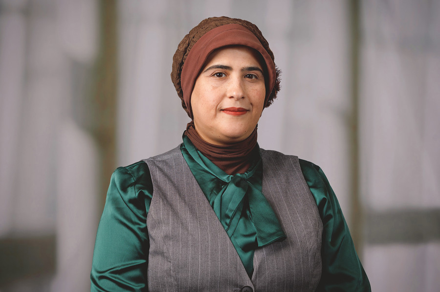 Headshot of Mabruka Alfaidi, MD, PhD.