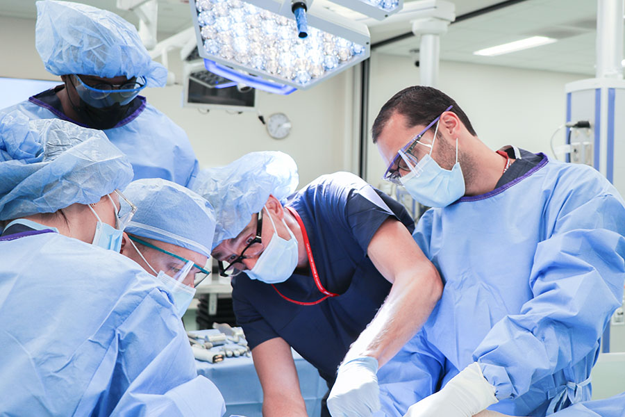 Residents train on surgical techniques.