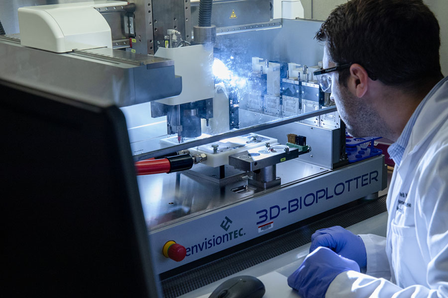 A student works in a research lab.