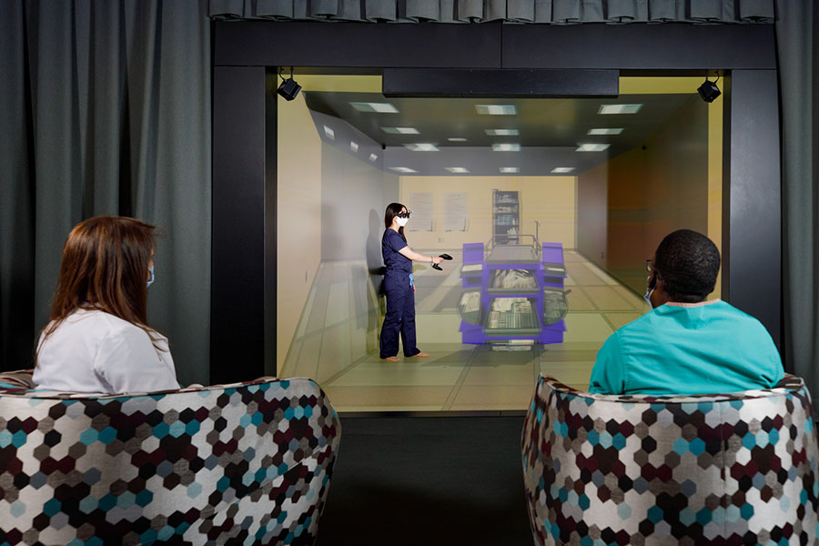 A holographic theater creates a virtual setting for skills practice.