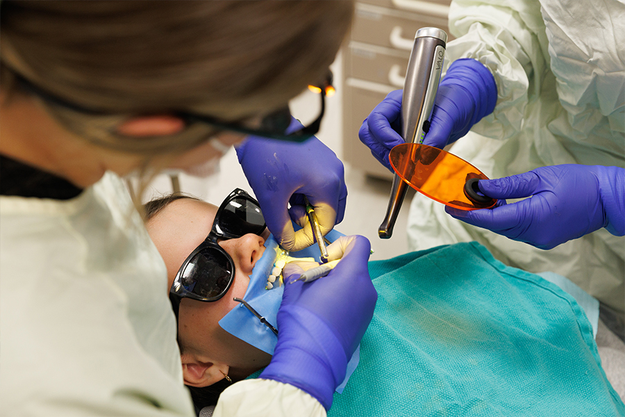 A boy receives dental work.