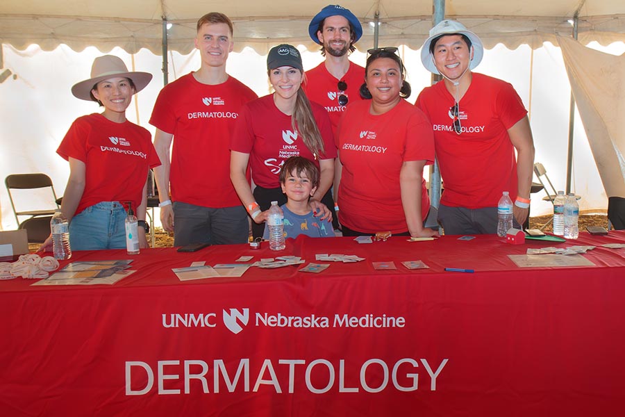 UNMC Dermatology giving out samples at the 2023 Cattlemen's Ball.