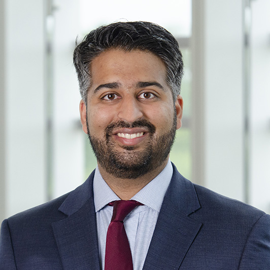 Dr. Faruq Pradhan smiles at the camera