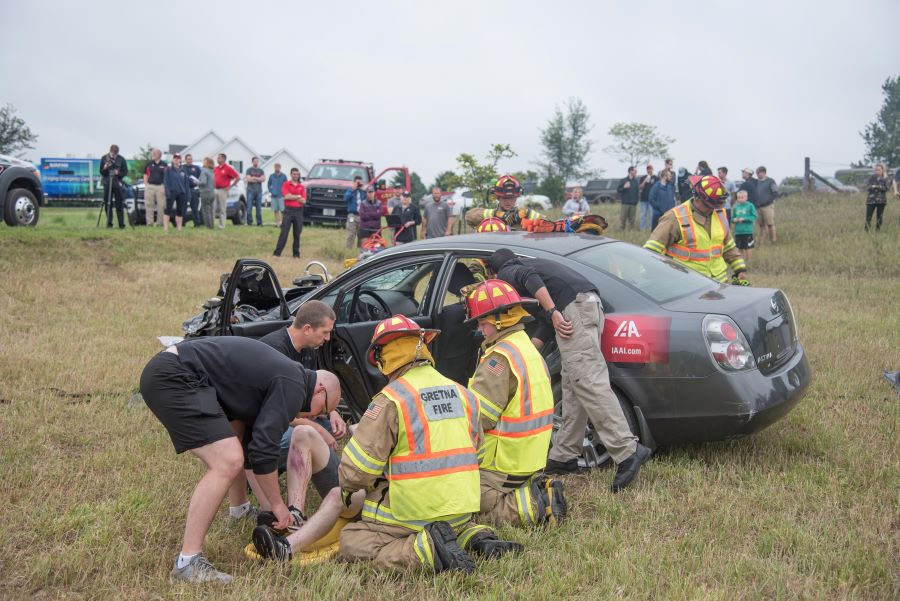 Omaha Fire assisting with a car crash simulation