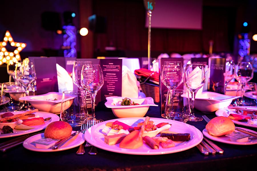 Up close photo of a table set for a dinner event.