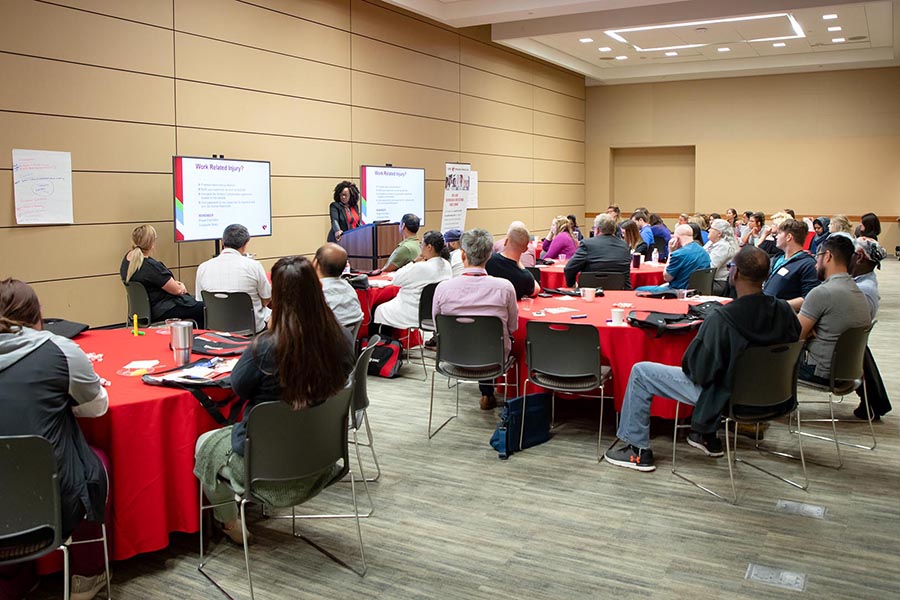 A small group gathers in the Events Center for a workshop.