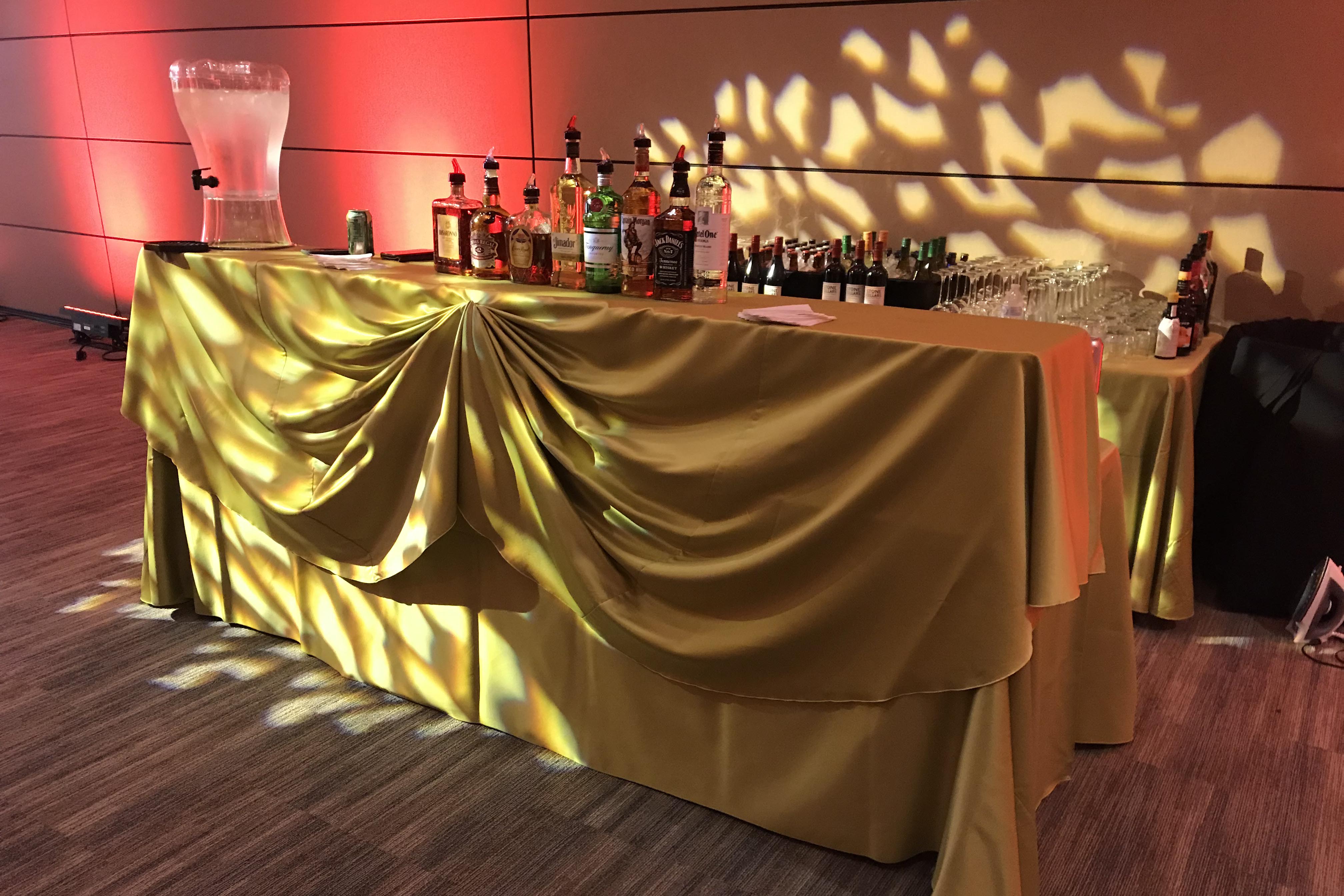 A view of a bar set-up for a reception.