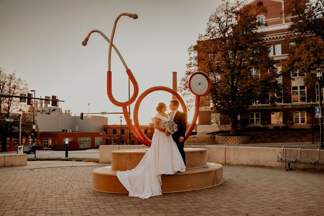 Bride and groom sneak away for a private moment.