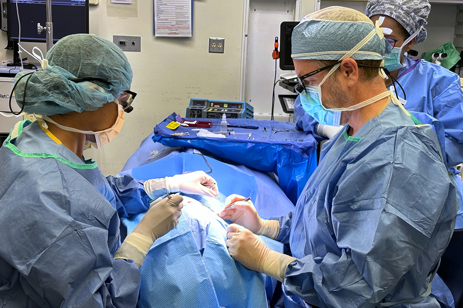 Dr. Paul Rychwalski and his fellow perform an operation at Children's Hospital & Medical Center. 