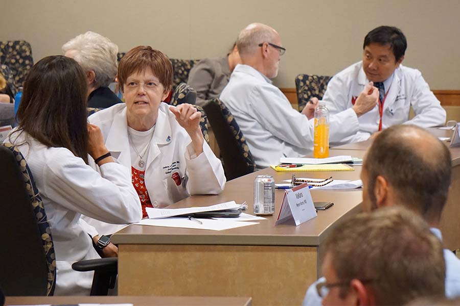 people participating in a faculty development session