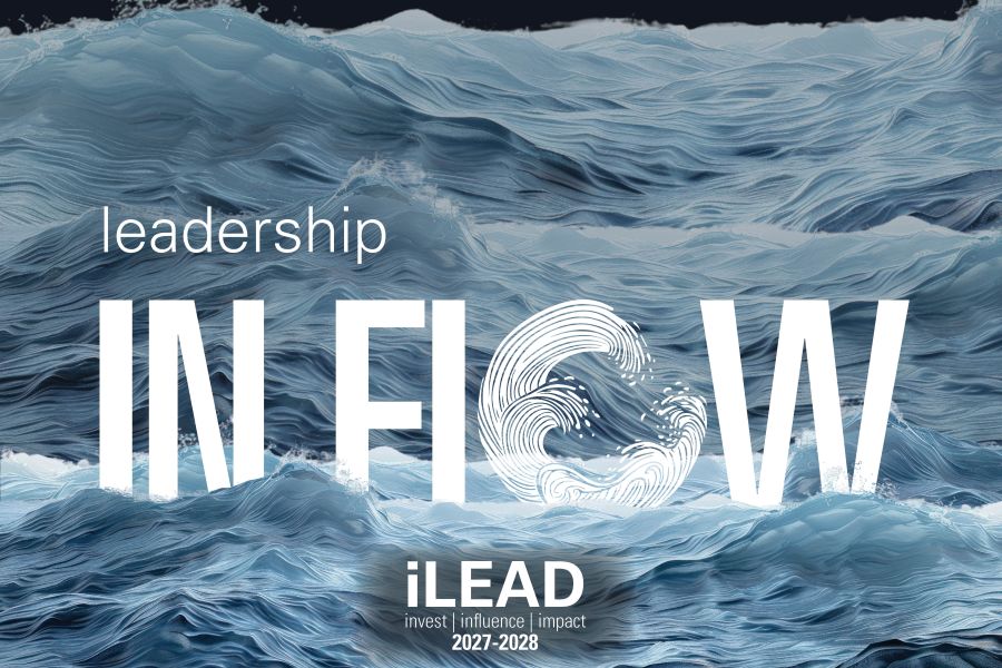 A image of churning waves on a black background, with the text "Leadership in Flow" partially submerged into the surface of the water.