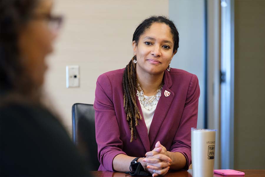 faculty engaging in conversation