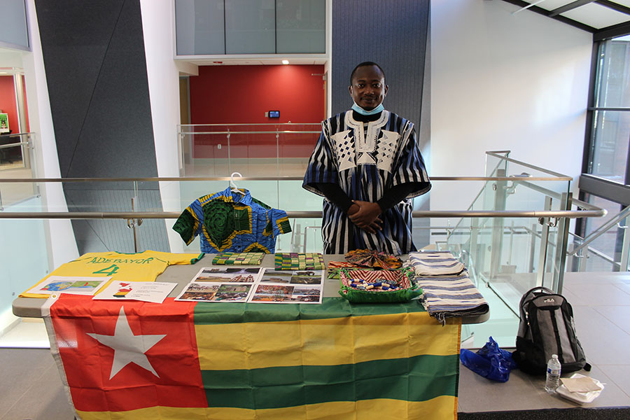 An international scholar participates in the Culture Expo during the 2021 International Education Week.