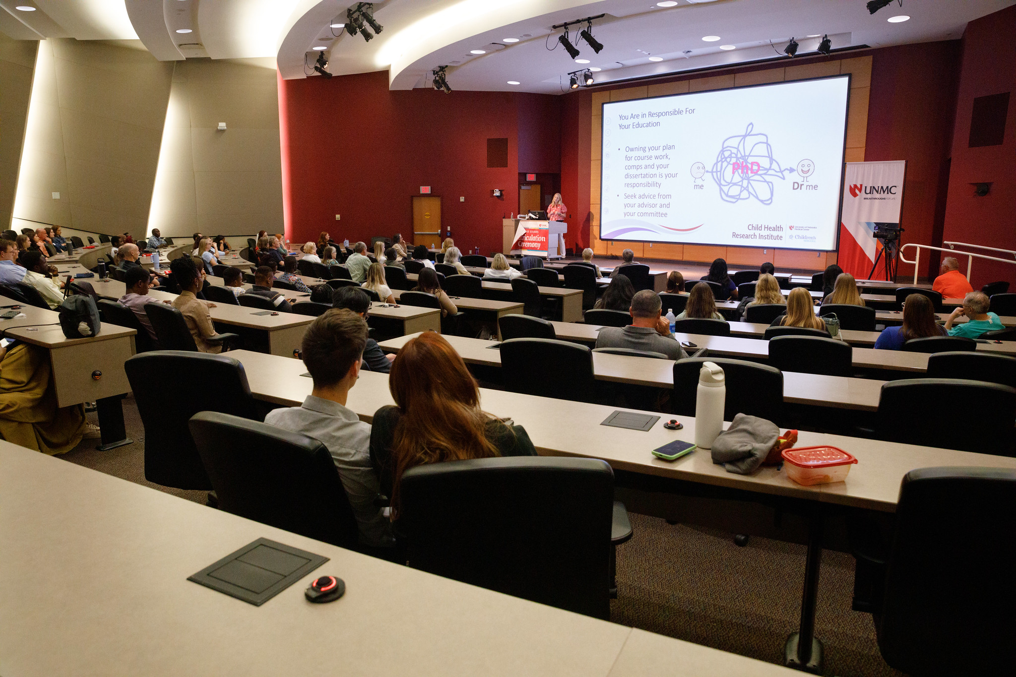 Students attend a seminar in a lecture hall