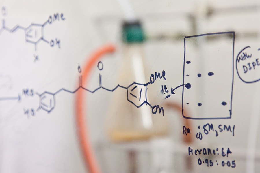 A chemical equation drawn on glass