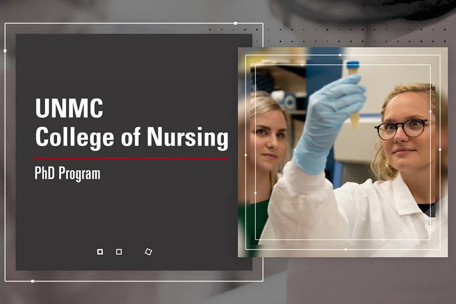 Nursing student holds up flask in a lab